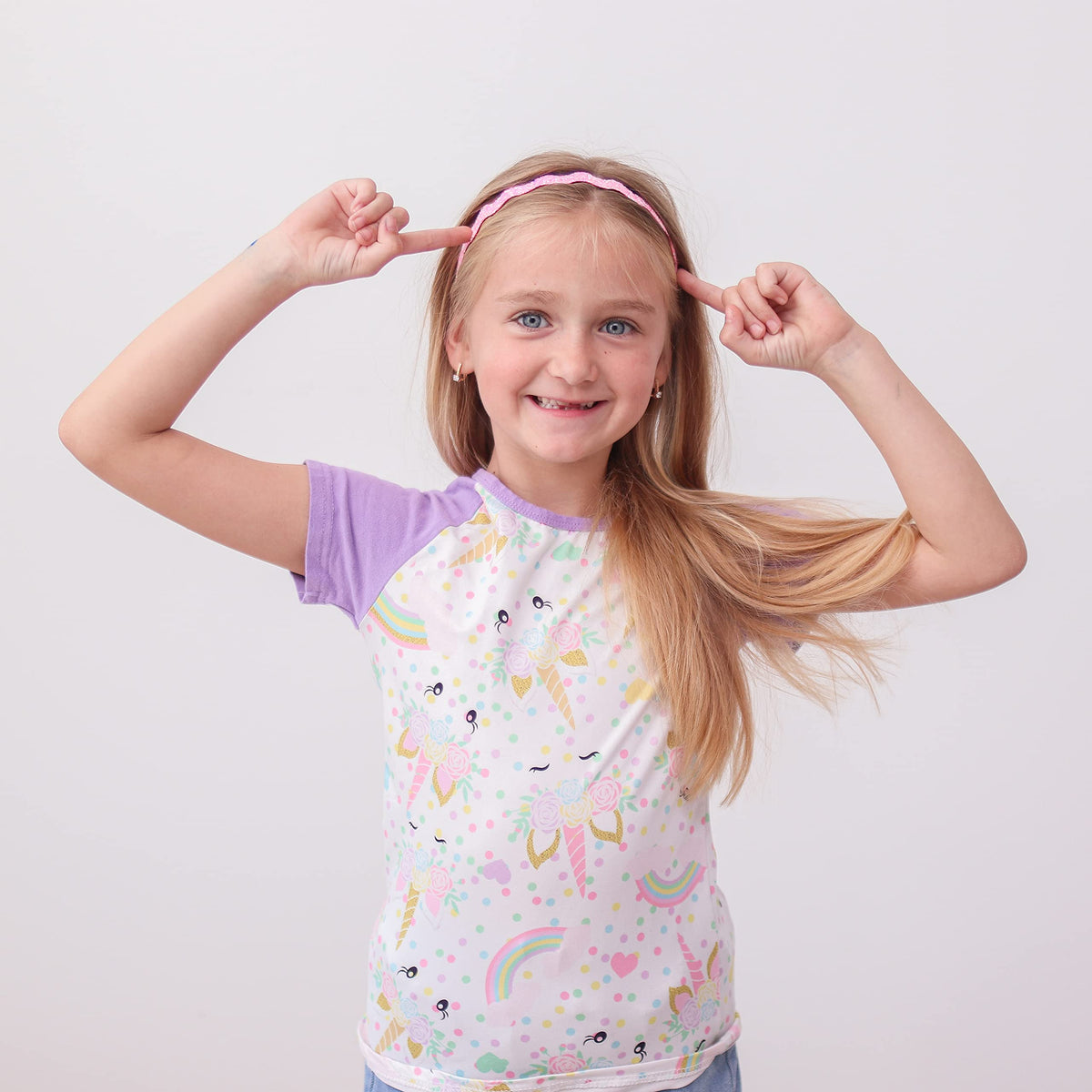 FROG SAC headband worn by child showing secure hold during play