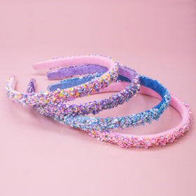 FROG SAC child wearing pink headband demonstrating stylish everyday wear