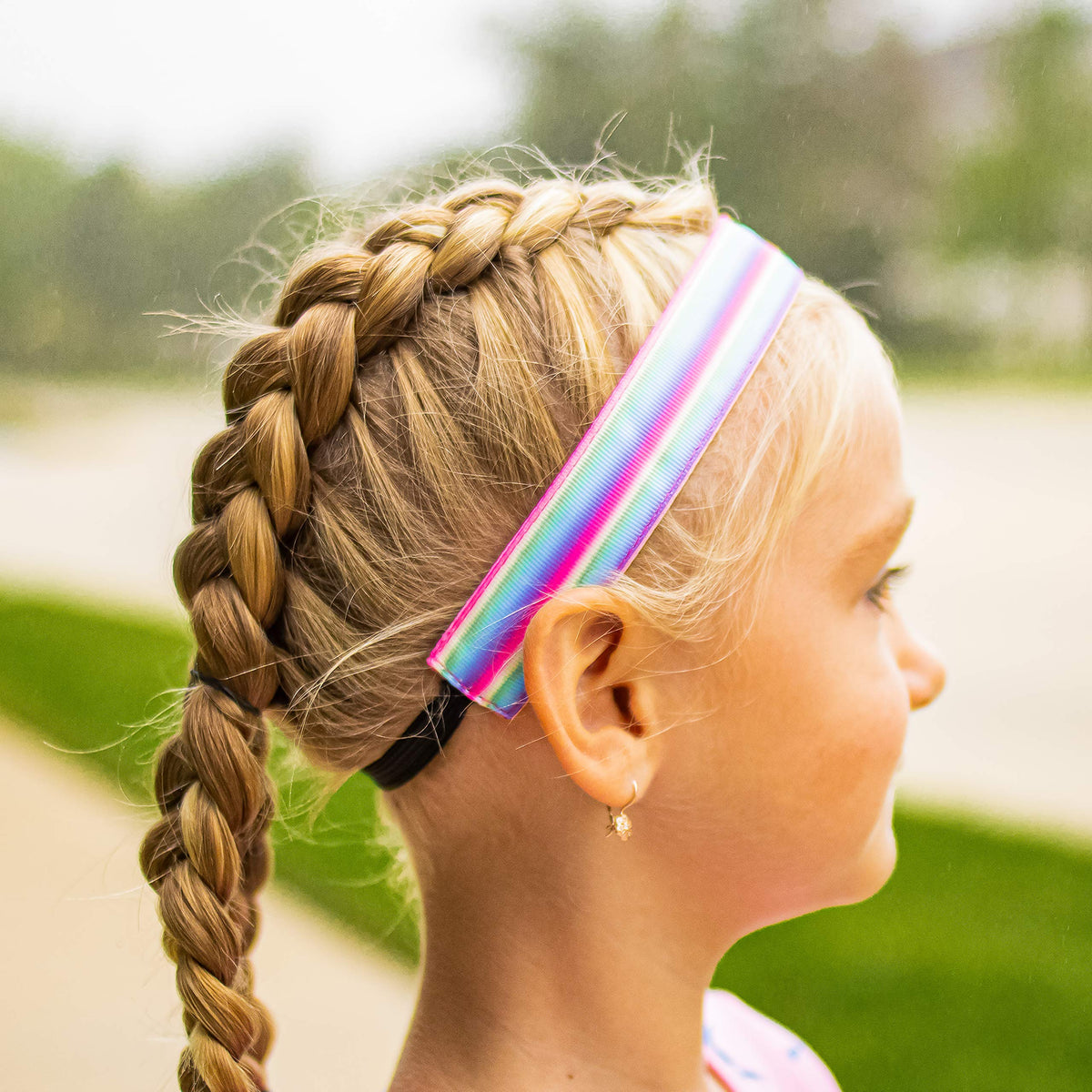 FROG SAC worn by girl outdoors illustrating comfortable fit and playful style during play