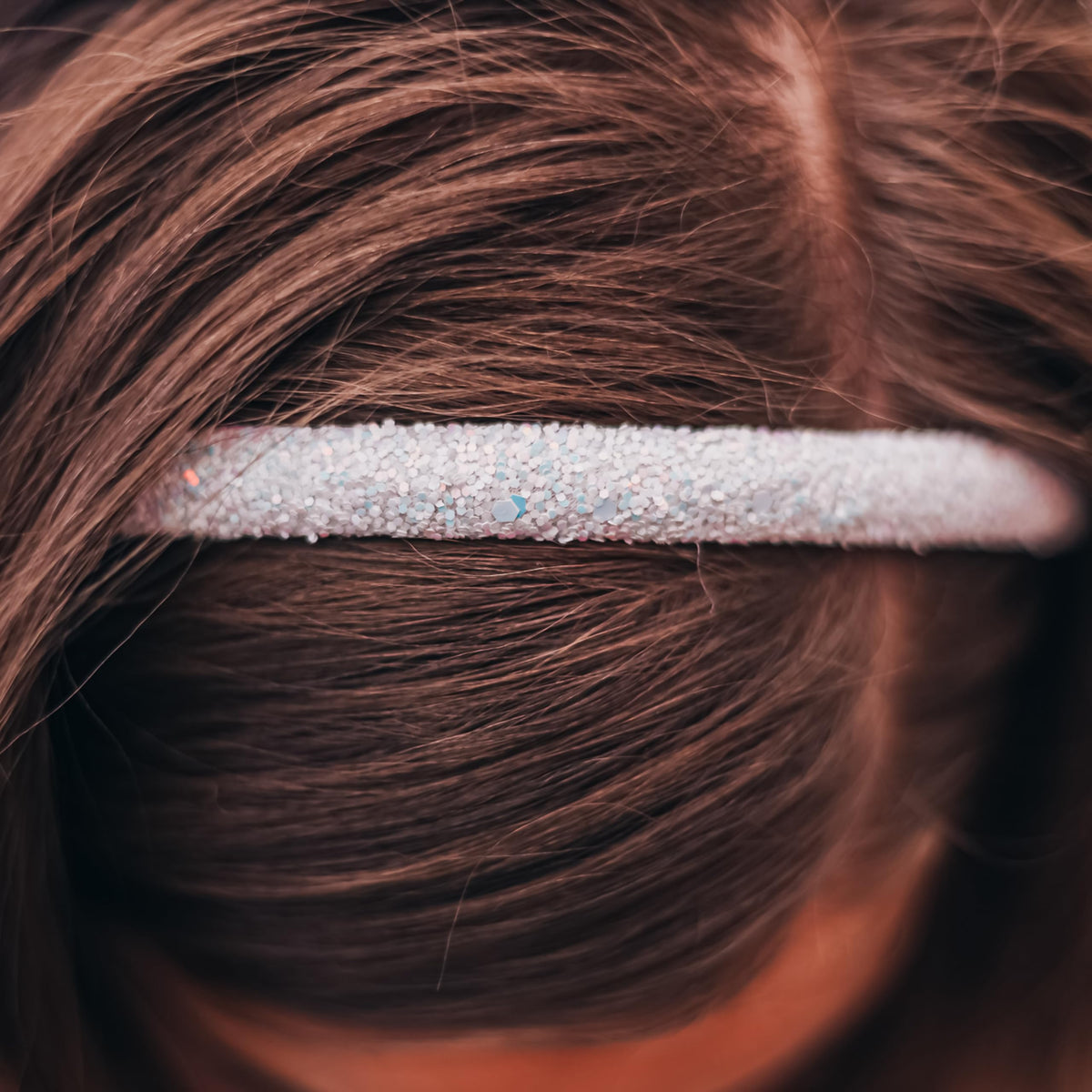 FROG SAC girl at party wearing headband adding sparkle to celebration outfit