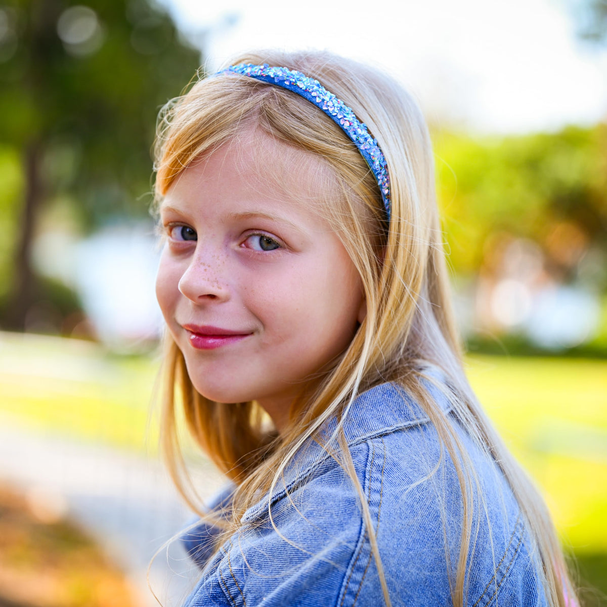 FROG SAC purple headband holding hair back to prevent stray strands