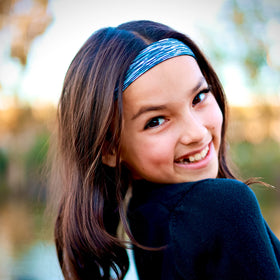 FROG SAC headbands arranged in a gift basket suggesting gifting and presentation use