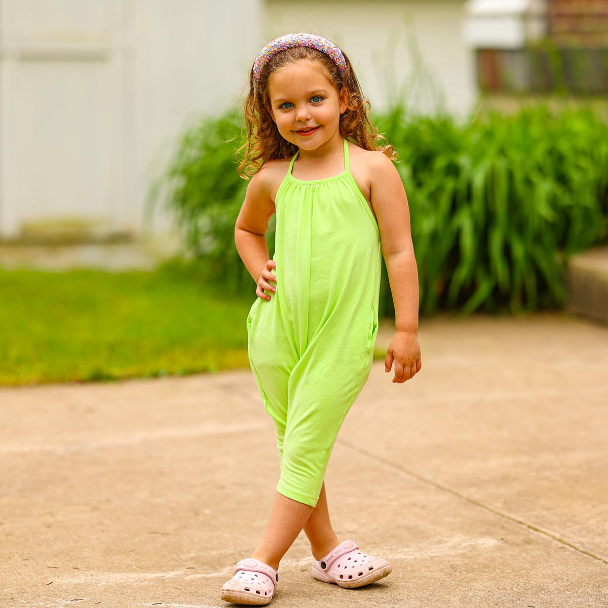 FROG SAC styled flatlay with outfit showing accessory pairs well with kids' clothes