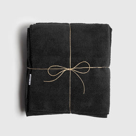 Fromm stacked folded towels in a shelf showing durable salon-ready set