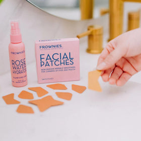 Frownies in a bedside setting suggesting overnight wrinkle care