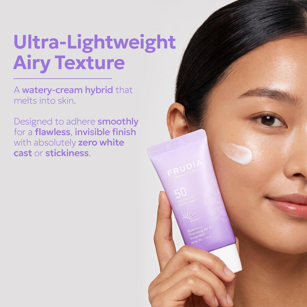 FRUDIA cream on hand scale to show coverage and amount needed, demonstrates easy spreadability