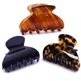 Fsmiling three-pack front view showing tortoise black brown clips and style benefit