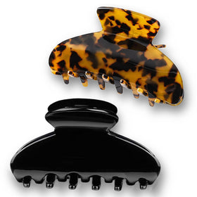 Fsmiling front view of tortoise and black clips showing chic look and secure hold