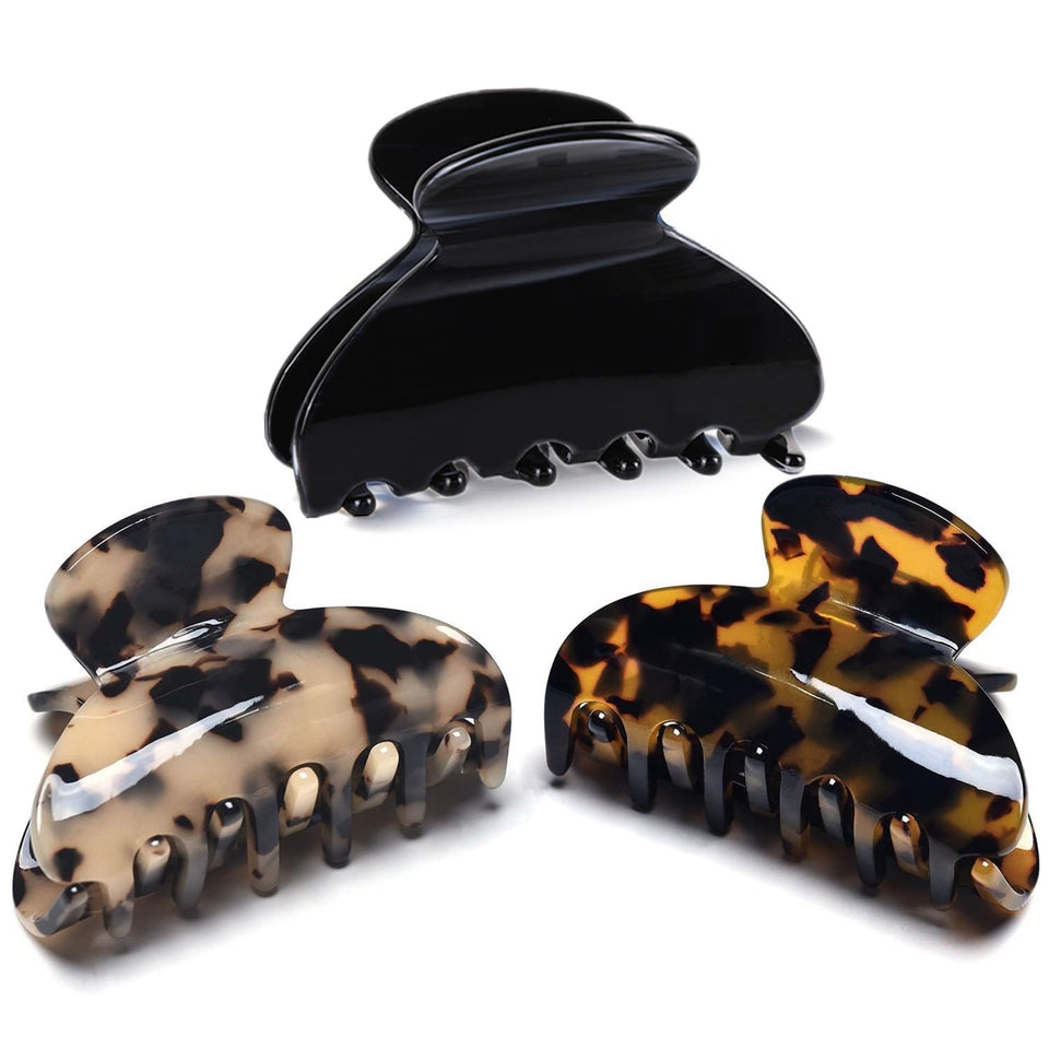Fsmiling front view of three tortoise and leopard clips shows stylish pack and versatility