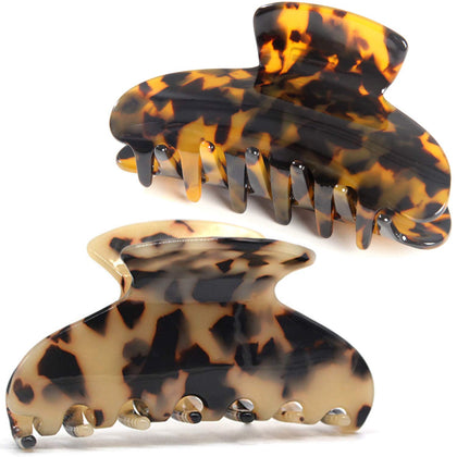 Fsmiling front view of large tortoise claw clip showing elegant hold