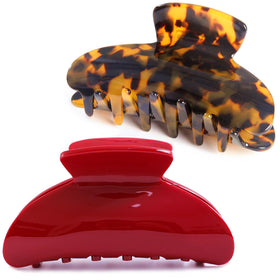 Fsmiling front view of tortoise and red clips showing stylish contrast