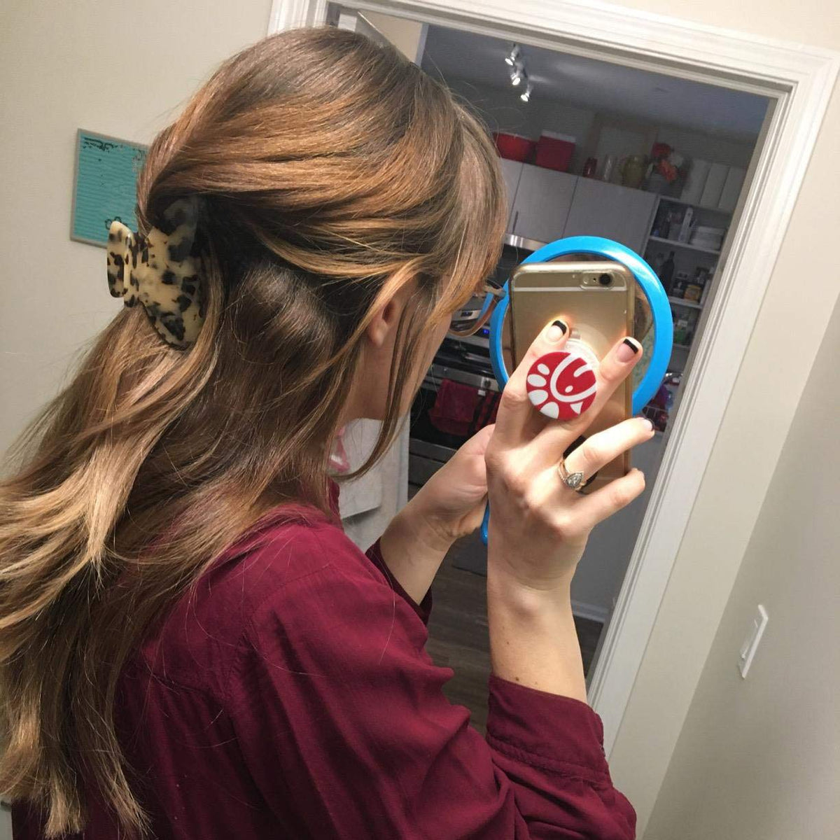 Fsmiling half-up style on thick hair showing reliable grip