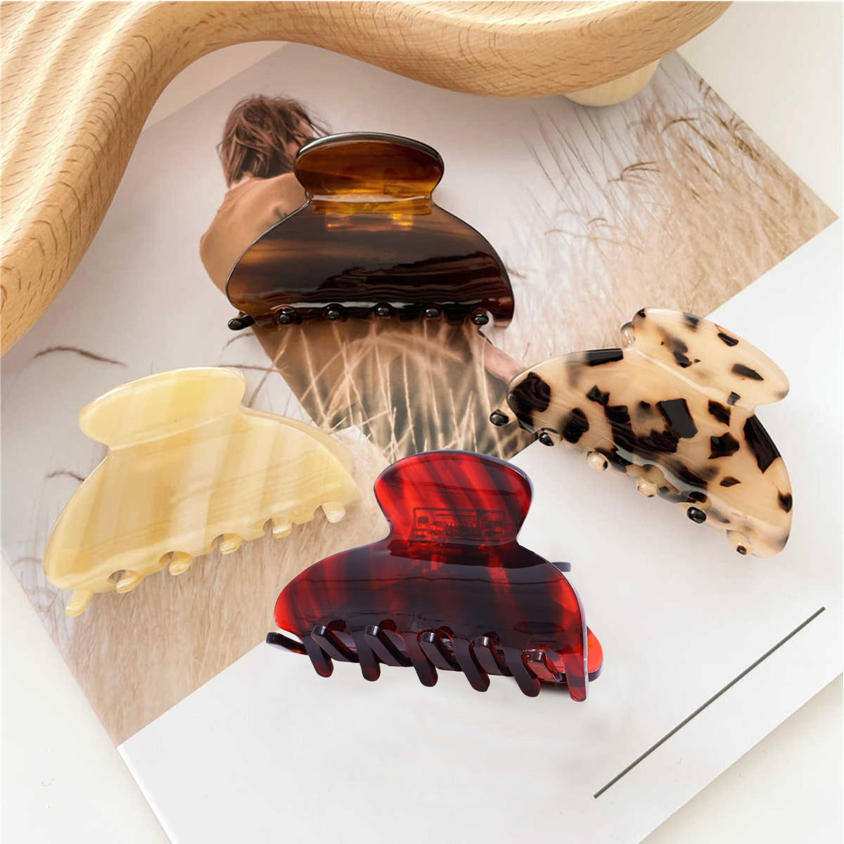 Fsmiling three clips laid flat showing color assortment for matching hair