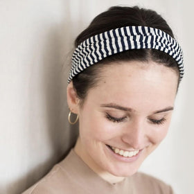 Fszsaa elastic closure detail showing secure stretch fit and hold