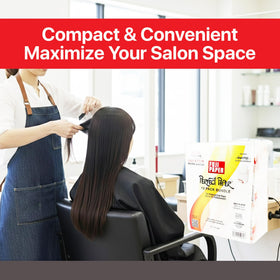 FUJI in-studio stylist using sheets to speed perm and color services