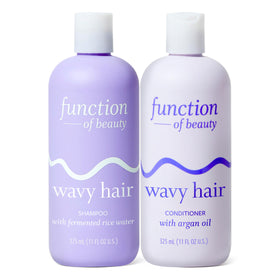 Function of Beauty front packaging of wavy shampoo and conditioner showing clean design and benefits