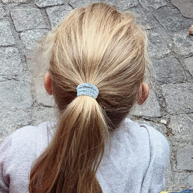 Funtopia band stretched to show high elasticity and secure hold for thick hair
