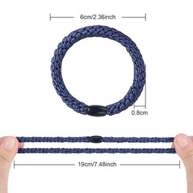 Funtopia hair tie on wrist beside ruler showing stretch and size for scale