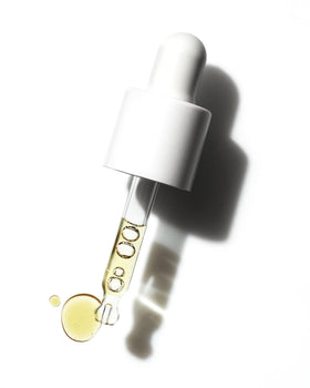 Fur detail cap and dropper showing precise dispensing and controlled use