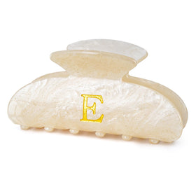 Fycert gold monogram hair clip front view showing elegant finish and secure hold