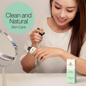 Gaia Body Care bottle next to a coin showing 1oz size and travel-friendly