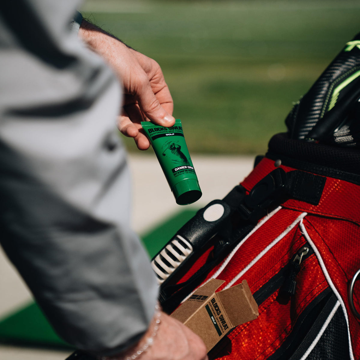 Golfer holding club after Gamer Grip application showing steady swing