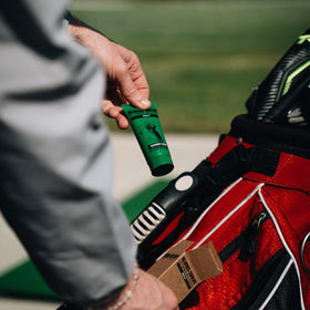 Golfer holding club after Gamer Grip application showing steady swing