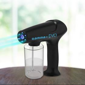GAMMA+ Evo Nano Mister next to hand to show compact size and 13 oz capacity for long sessions