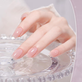 GAOY bottle beside coin demonstrating compact 7.3ml travel-friendly size