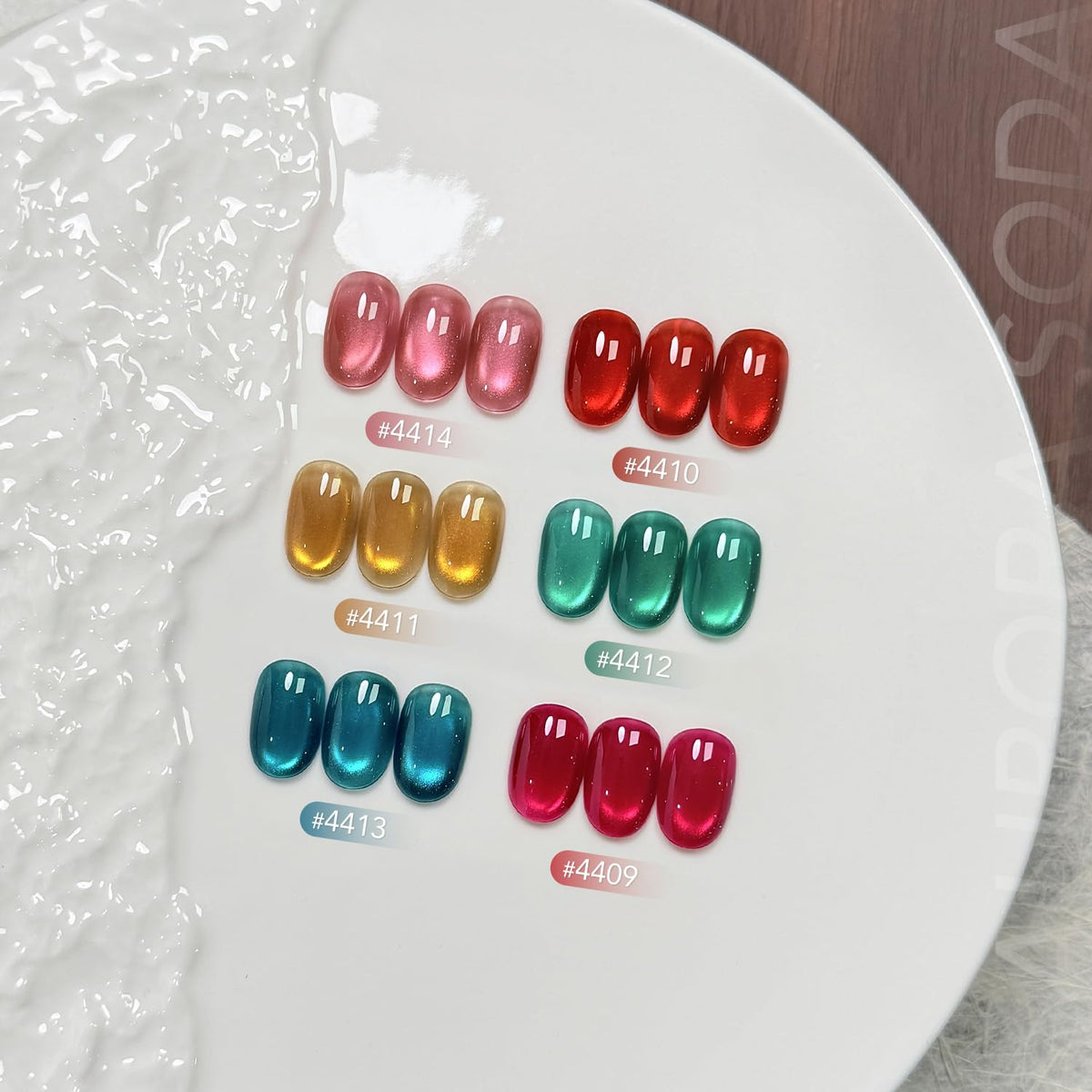 GAOY bottles in hand for scale illustrating 6.5ml travel-friendly size