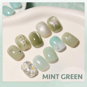GAOY finished manicure lifestyle shot showcasing mint glitter cat-eye nails