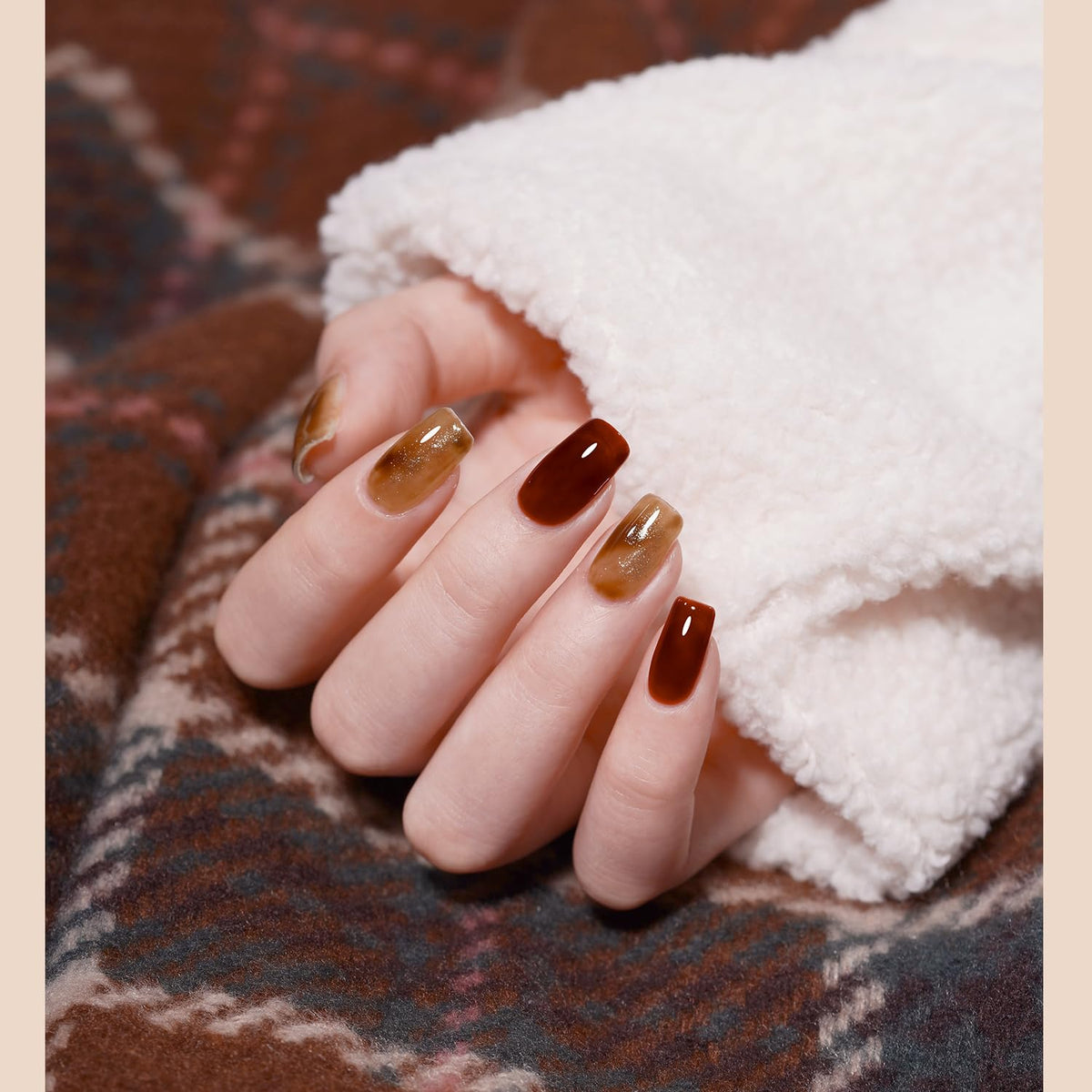 GAOY nails in use with tortoise design showing creative layering and salon-quality look
