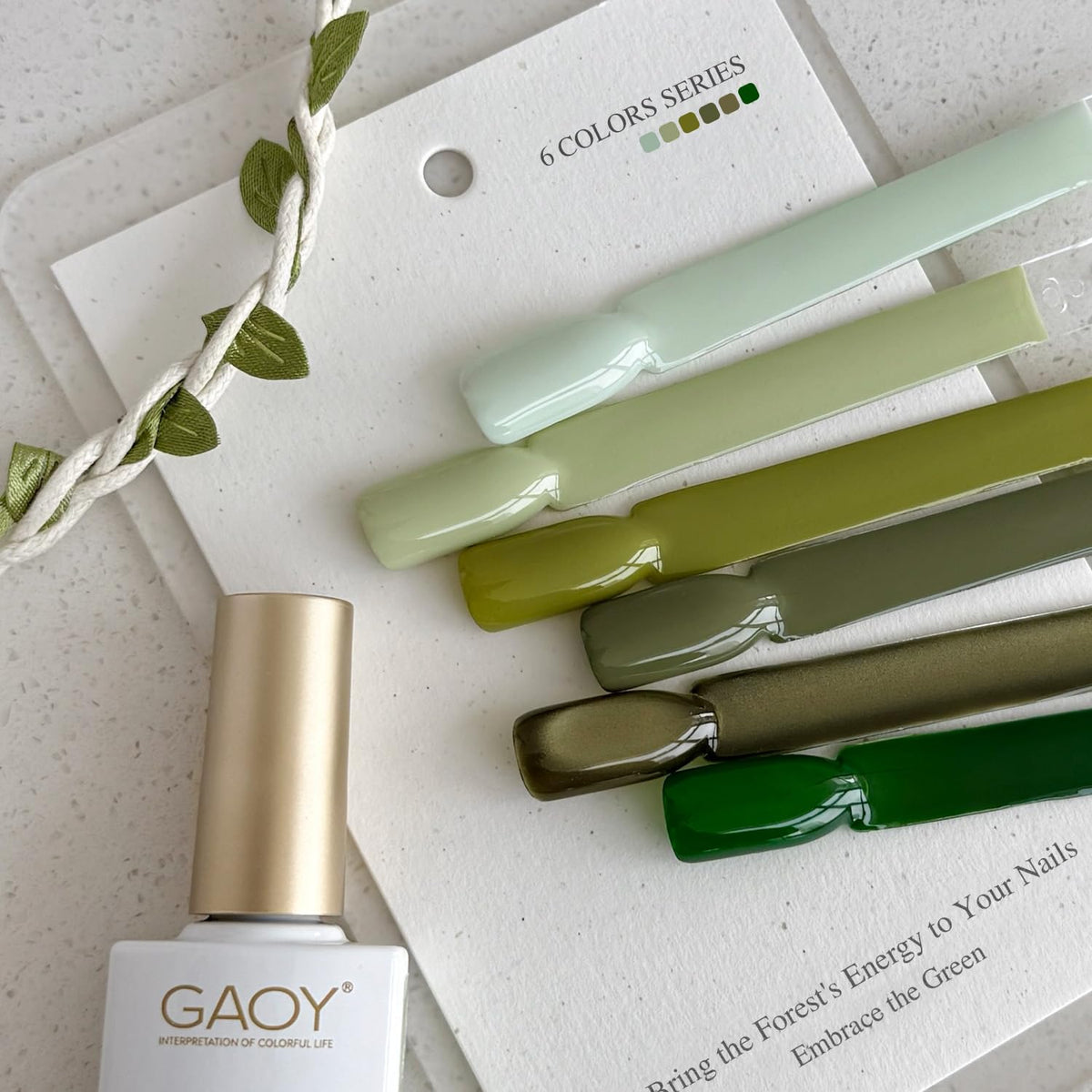 GAOY swatch strip of six dark green shades showing color range and shimmer payoff