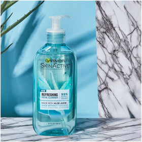 Garnier dispensing gel onto hand for gentle cleansing demo