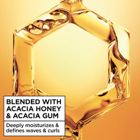 Garnier application on damp hair demonstrating even distribution and scrunching benefit