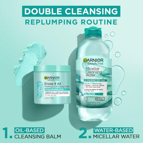 Garnier balm in hand being massaged on dry skin for quick removal