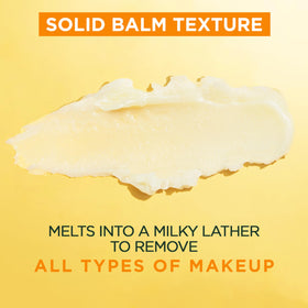 Garnier balm on fingers demonstrating easy melting action for makeup removal
