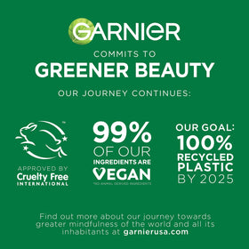 Garnier bottle on bathroom vanity among skincare for a brightening morning routine