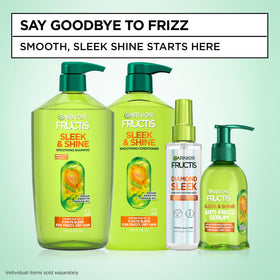 Garnier Fructis application on damp hair for pre-styling frizz control