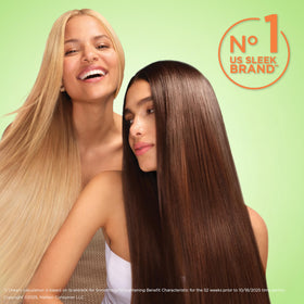 Garnier Fructis application on dry hair to tame flyaways and boost shine