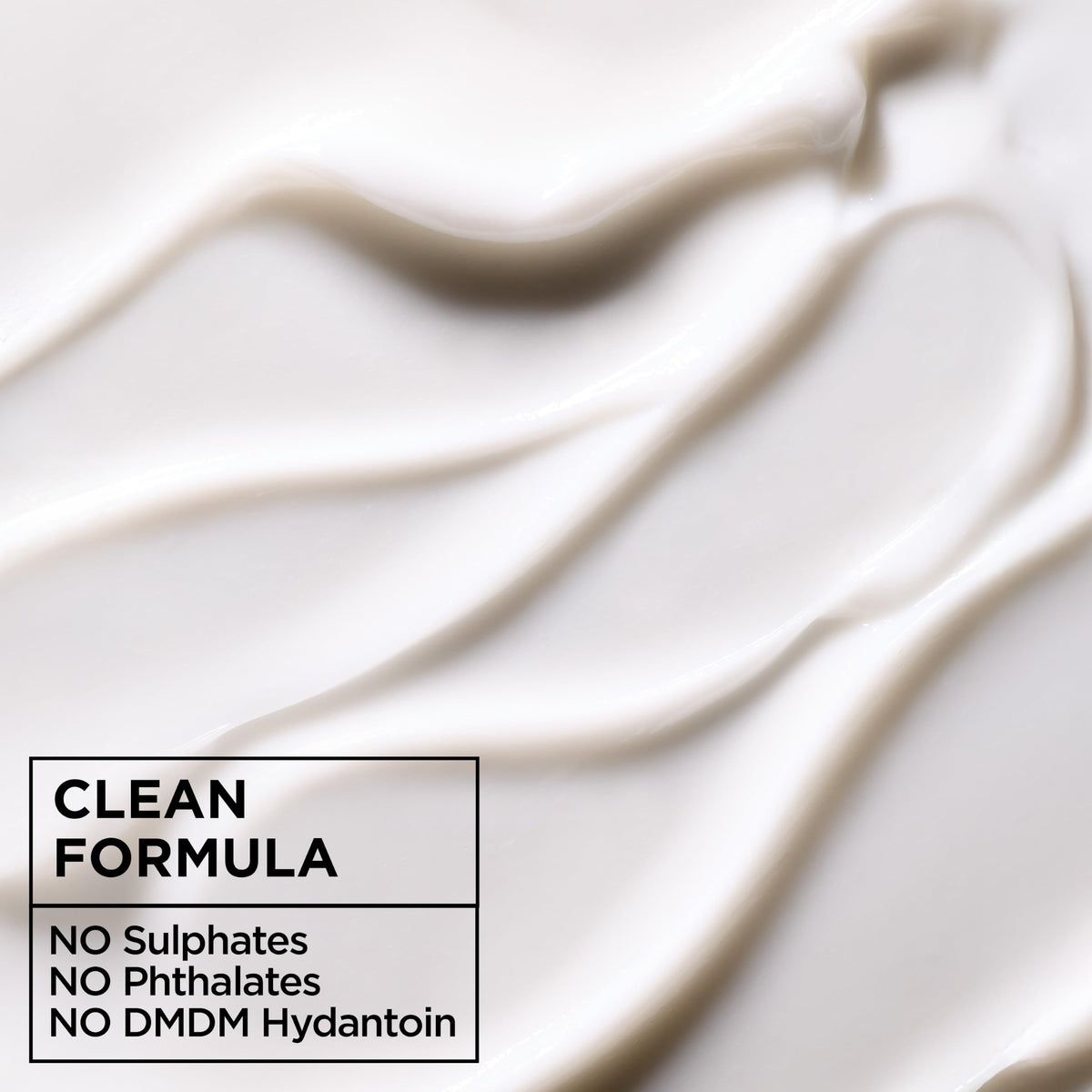 Garnier Fructis back label close-up showing vegan and ingredient claims