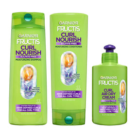 Garnier Fructis front packaging showing full curl nourish three-piece set benefits