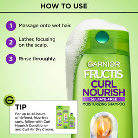 Application on wet hair using Garnier Fructis products for defined, frizz-reduced curls