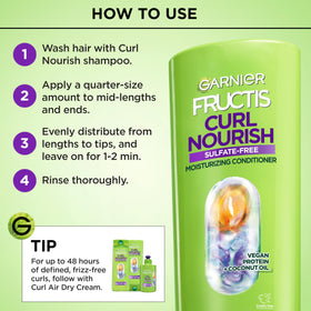 Garnier Fructis after-use detangled curls demonstrating improved definition