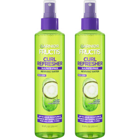 Garnier Fructis front packaging showing two 8.5 oz bottles and product benefit
