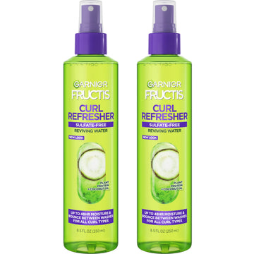 Garnier Fructis front packaging showing two 8.5 oz bottles and product benefit