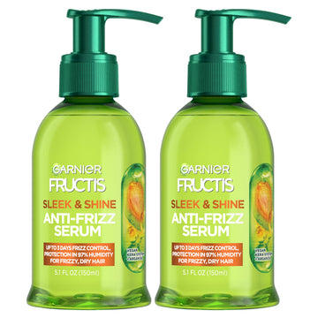 Garnier Fructis front packaging showing twin 5.1 fl oz bottles and benefits