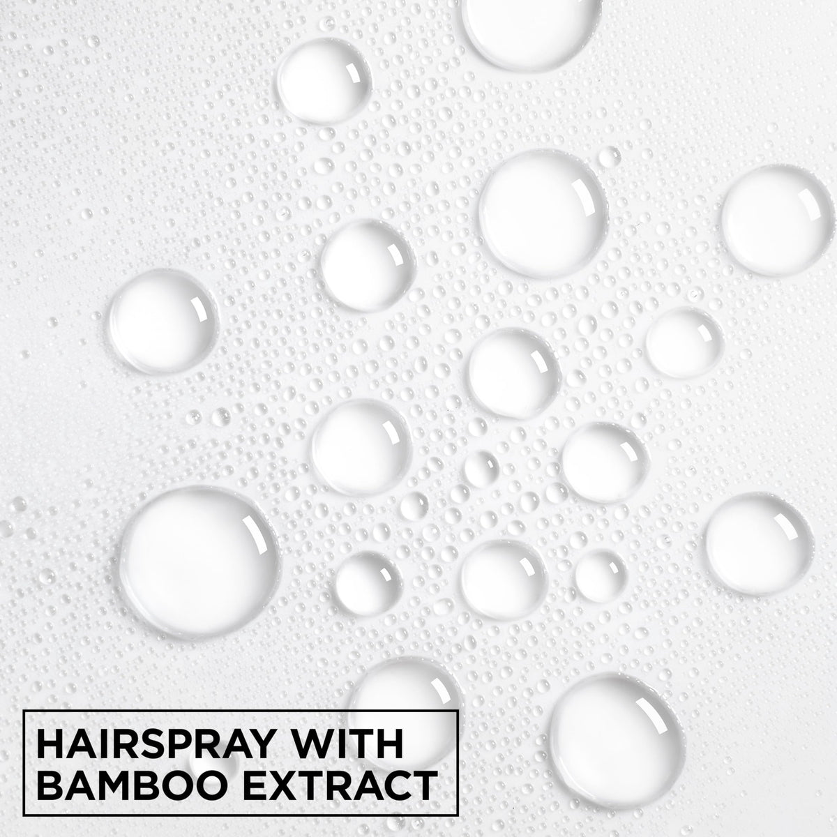 Garnier Fructis hairspray securing an updo to demonstrate long-lasting hold and frizz control