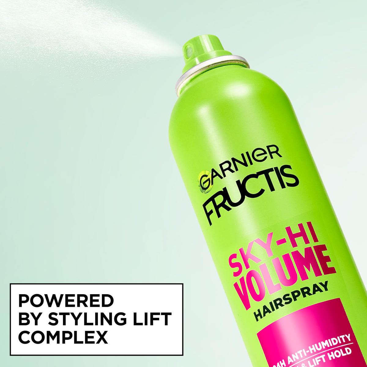 Garnier Fructis hands spraying roots to demonstrate lift and fullness