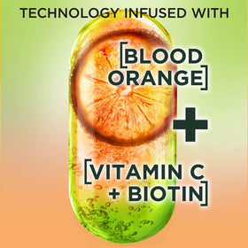 Product label close-up with Garnier biotin and vitamin C ingredients for ingredient transparency